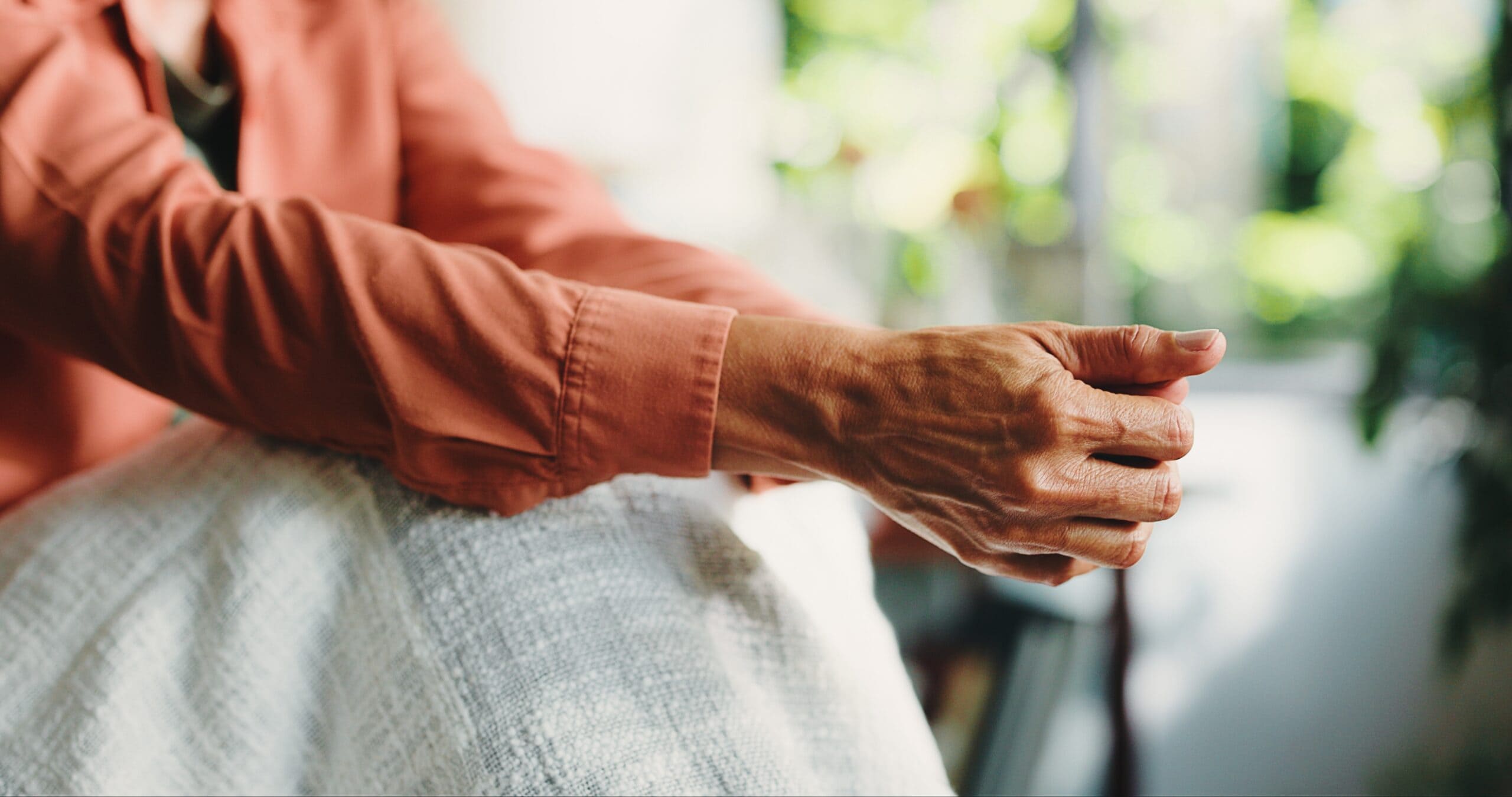 Woman hand's after asking herself does drug abuse cause seizures.